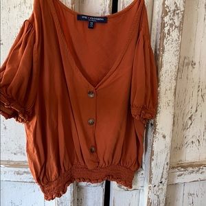 Orange shirt would go perfect with jeans!